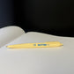 Yellow three sided square pen made to look like butter